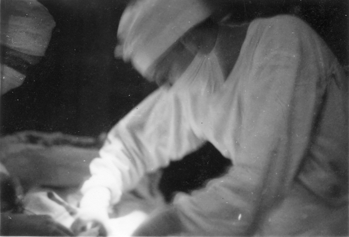 Surgery at sea.<br>Dr. Mrazek removing E. Pelletier&rsquo;s appendix, 11APR1944.