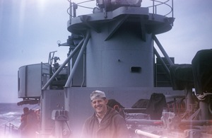 66 &ndash; Lt. (j.g.) Edmund B. Bossart Jr. near torpedo tubes